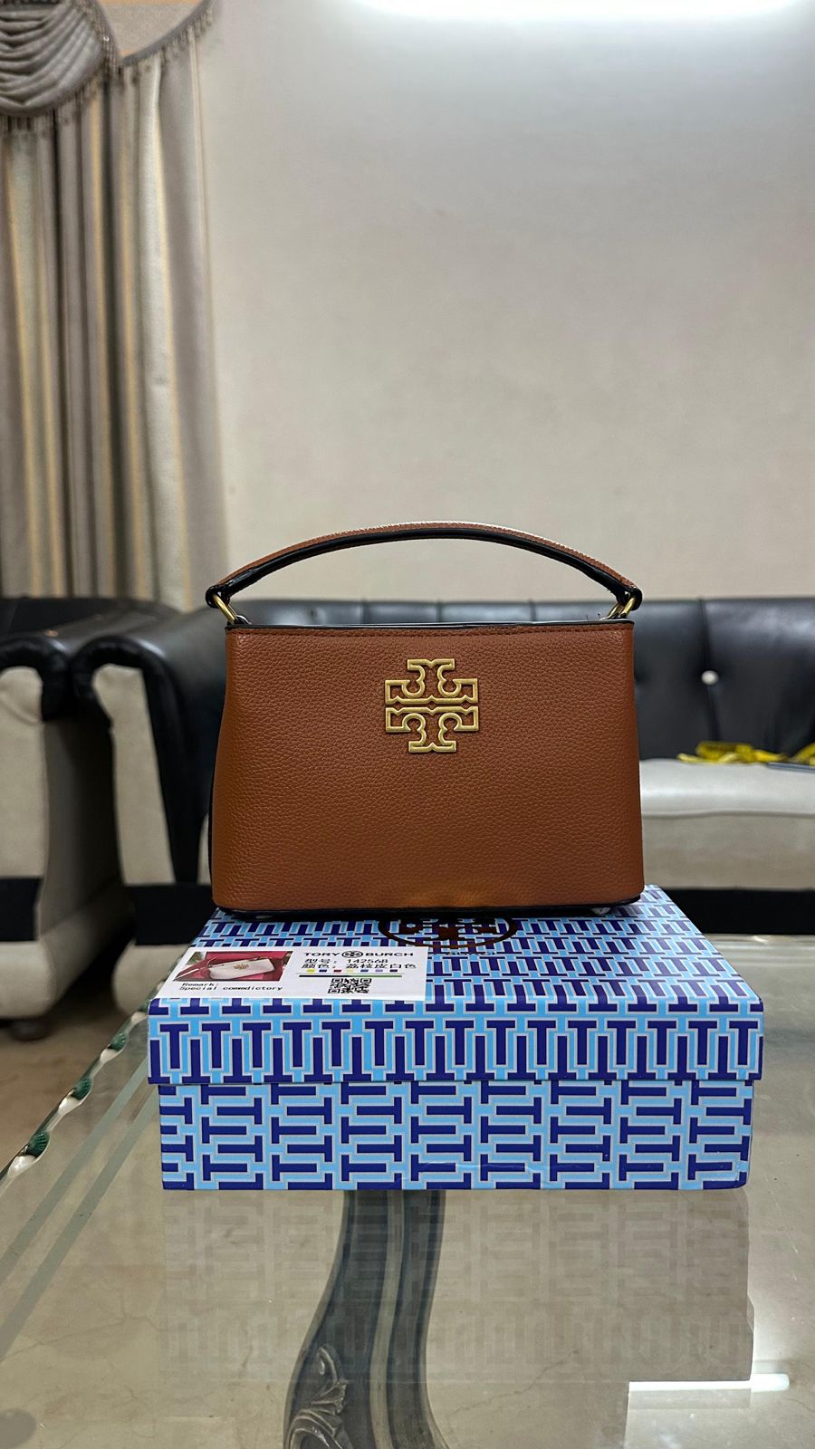 Tory Burch – Signature Style & Premium Craftsmanship (Brown)