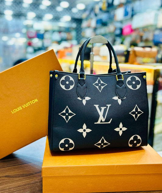 Louis Vuitton On The Go – AAA Quality, Official Model (Black/White)
