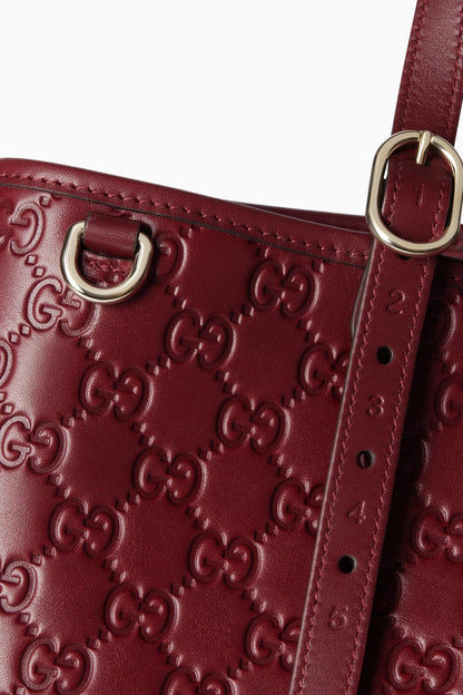 GUCCI GG EMBLEM DEBOSSED LEATHER TOTE – Women Bag (Maroon)