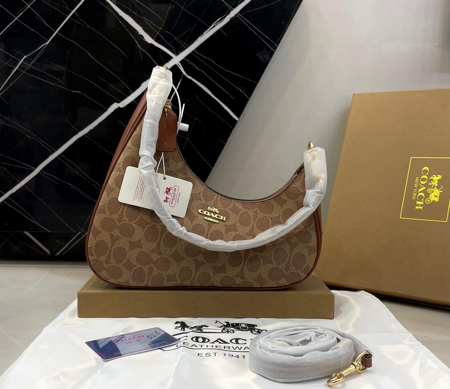 C-O-A-C-H Twisted Teri Shoulder Women Bag – Signature Canvas Edition (Brown-2)