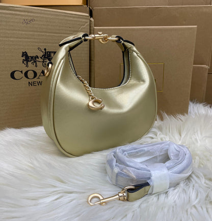 C-O-A-C-H Jonie Plain Mini Women Bag – Compact Luxury Edition (Gold)