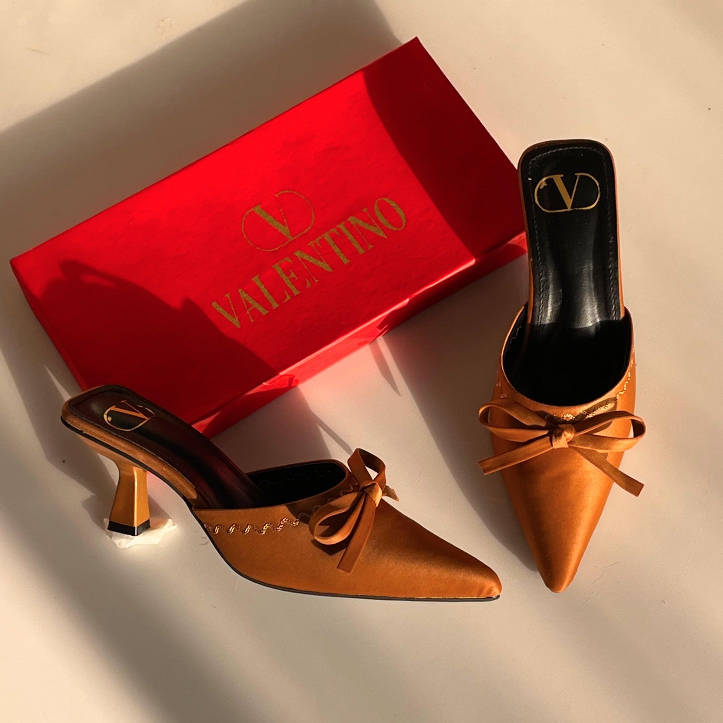 V-A-L-E-N-T-I-N-O Signature Heels – Chic Elevated Women Footwear (Orange)