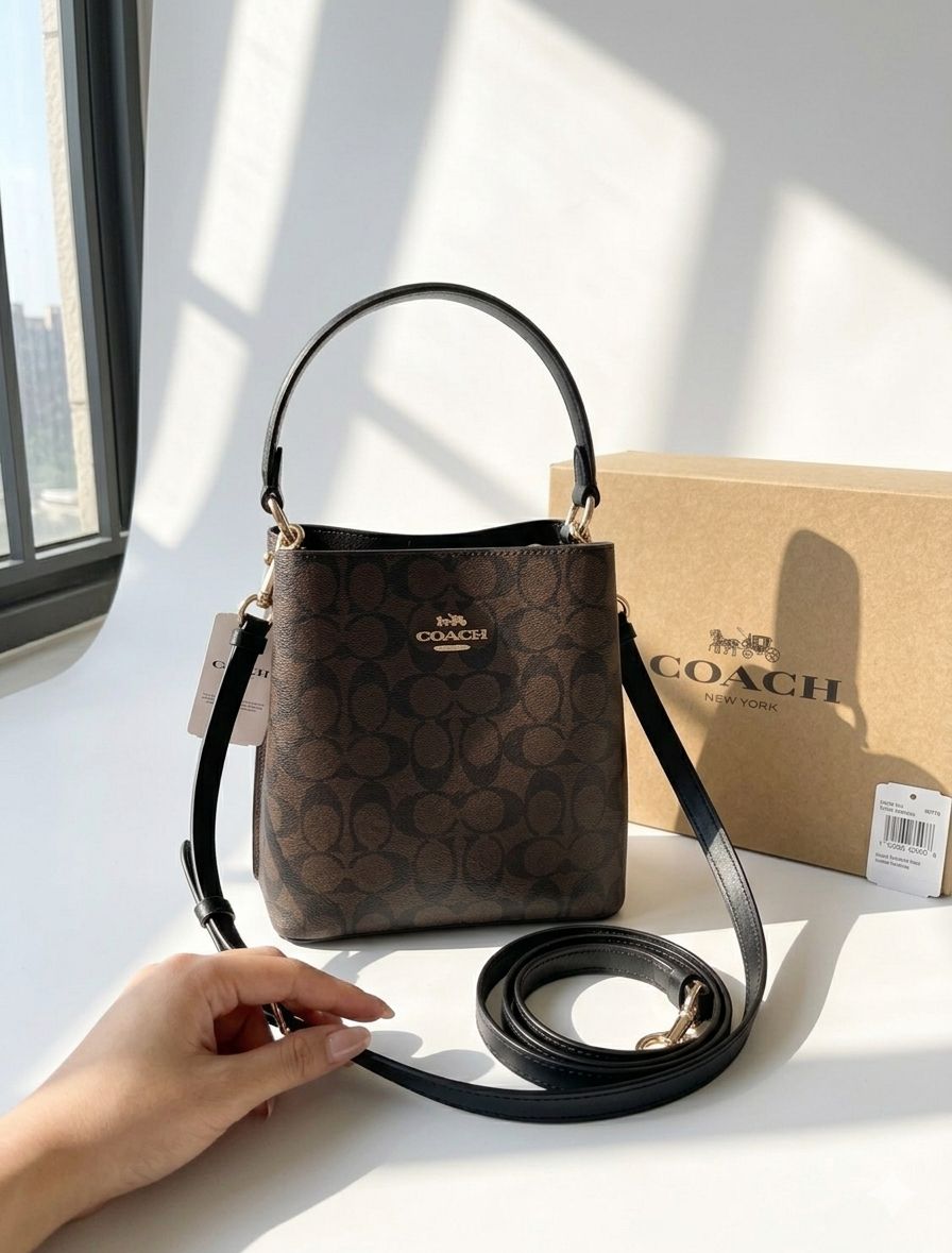 C-O-A-C-H Small Town Bucket Women Bag – Signature Canvas Master Series (Brown/Black)