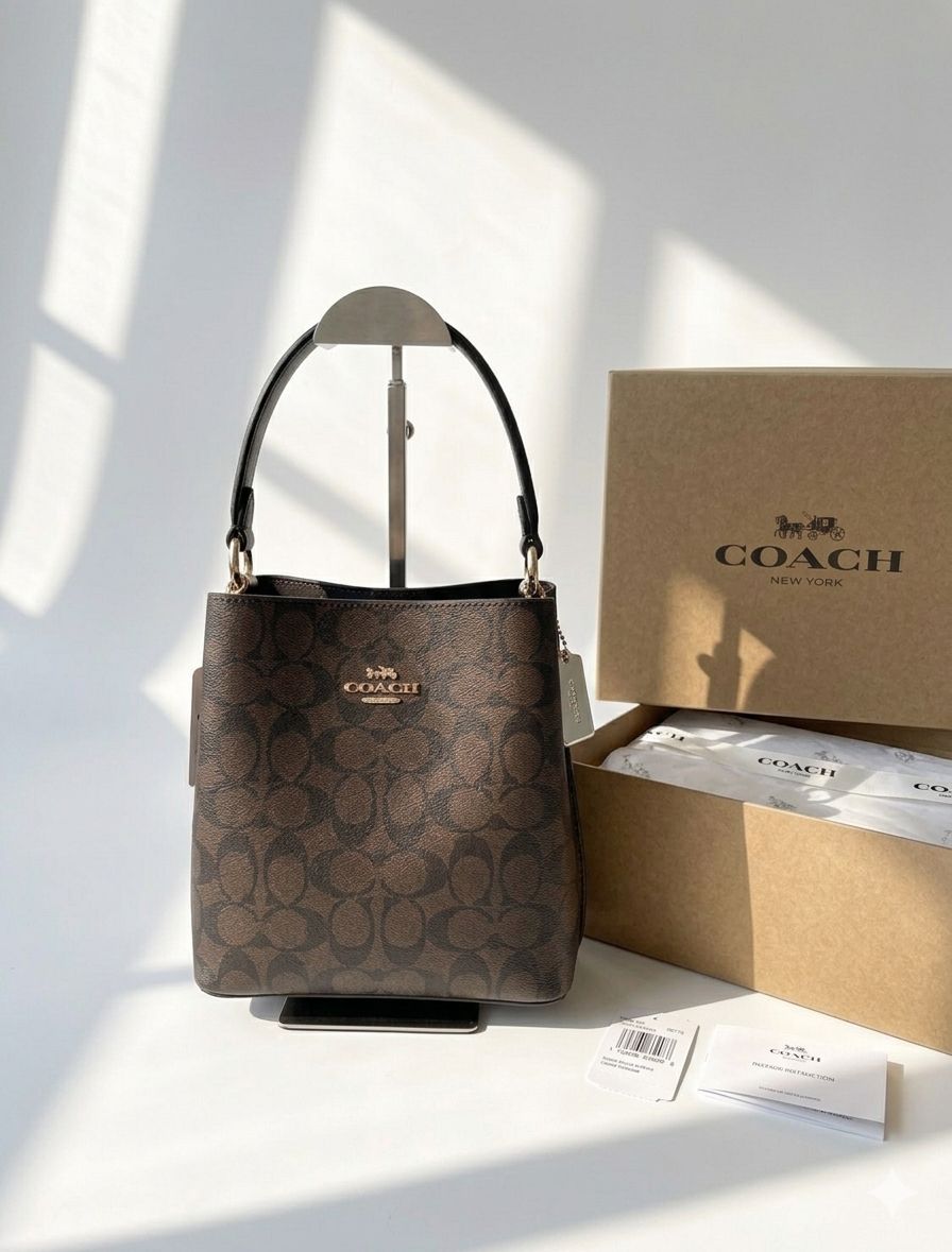 C-O-A-C-H Small Town Bucket Women Bag – Signature Canvas Master Series (Brown/Black)
