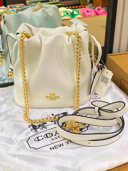 C-O-A-C-H Faye Mini Drawstring Bag – Elegant Luxe Women Bag (White)