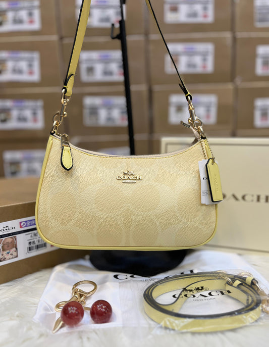 C-O-A-C-H Teri Shoulder Women Bag in Signature Canvas (Yellow Beige)