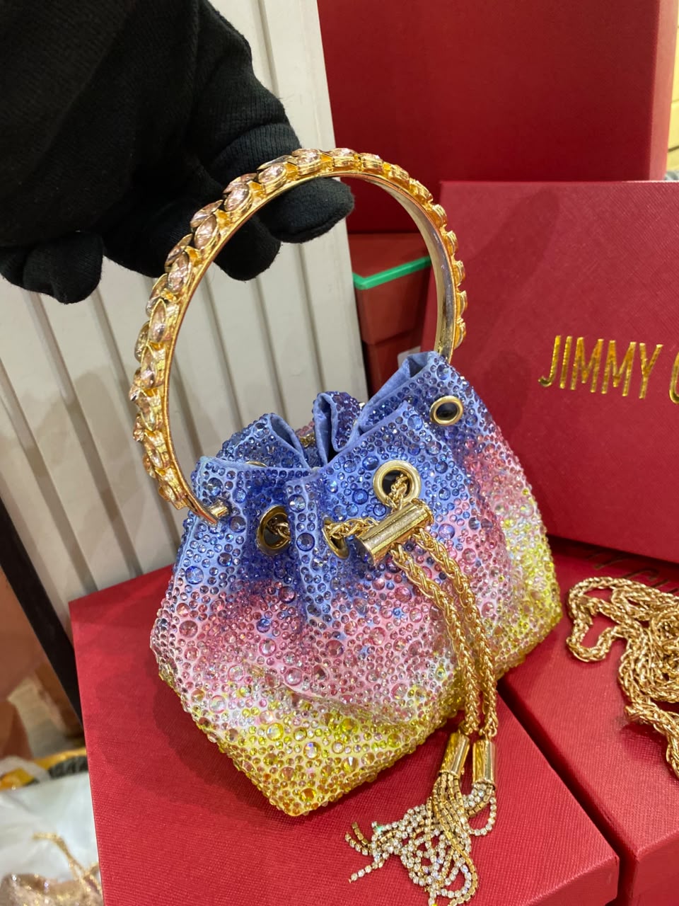J-I-M-M-Y C-H-O-O Bon Bon Deep Merlot Satin & Crystal Hotfix Bucket Bag (Blue with Multi Colors)