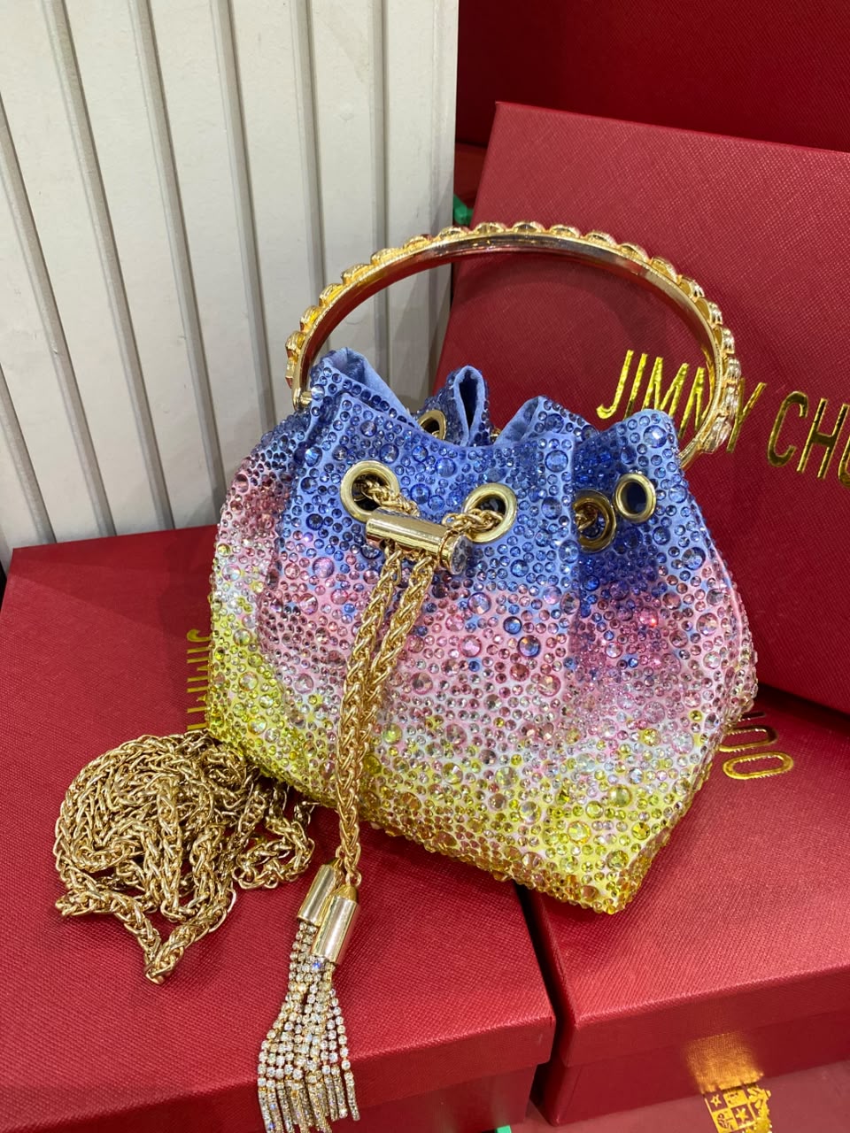 J-I-M-M-Y C-H-O-O Bon Bon Deep Merlot Satin & Crystal Hotfix Bucket Bag (Blue with Multi Colors)