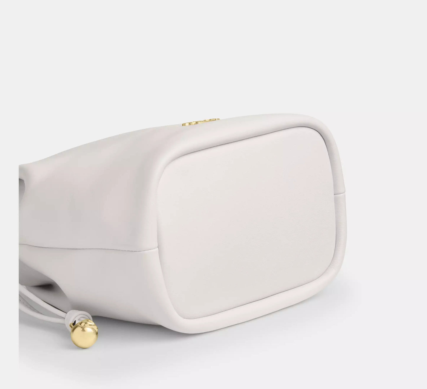 C-O-A-C-H Faye Mini Drawstring Bag – Elegant Luxe Women Bag (White)