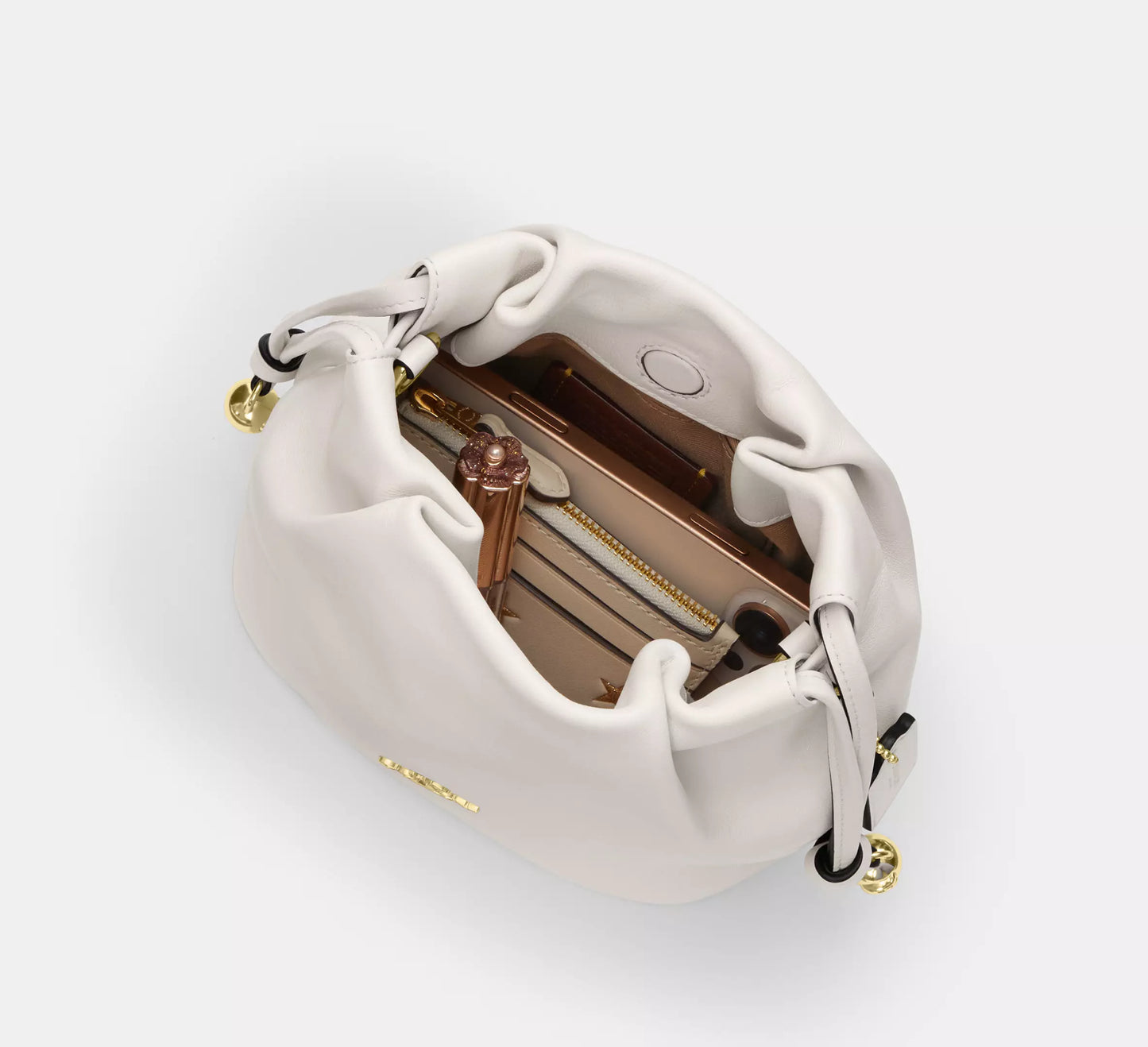 C-O-A-C-H Faye Mini Drawstring Bag – Elegant Luxe Women Bag (White)