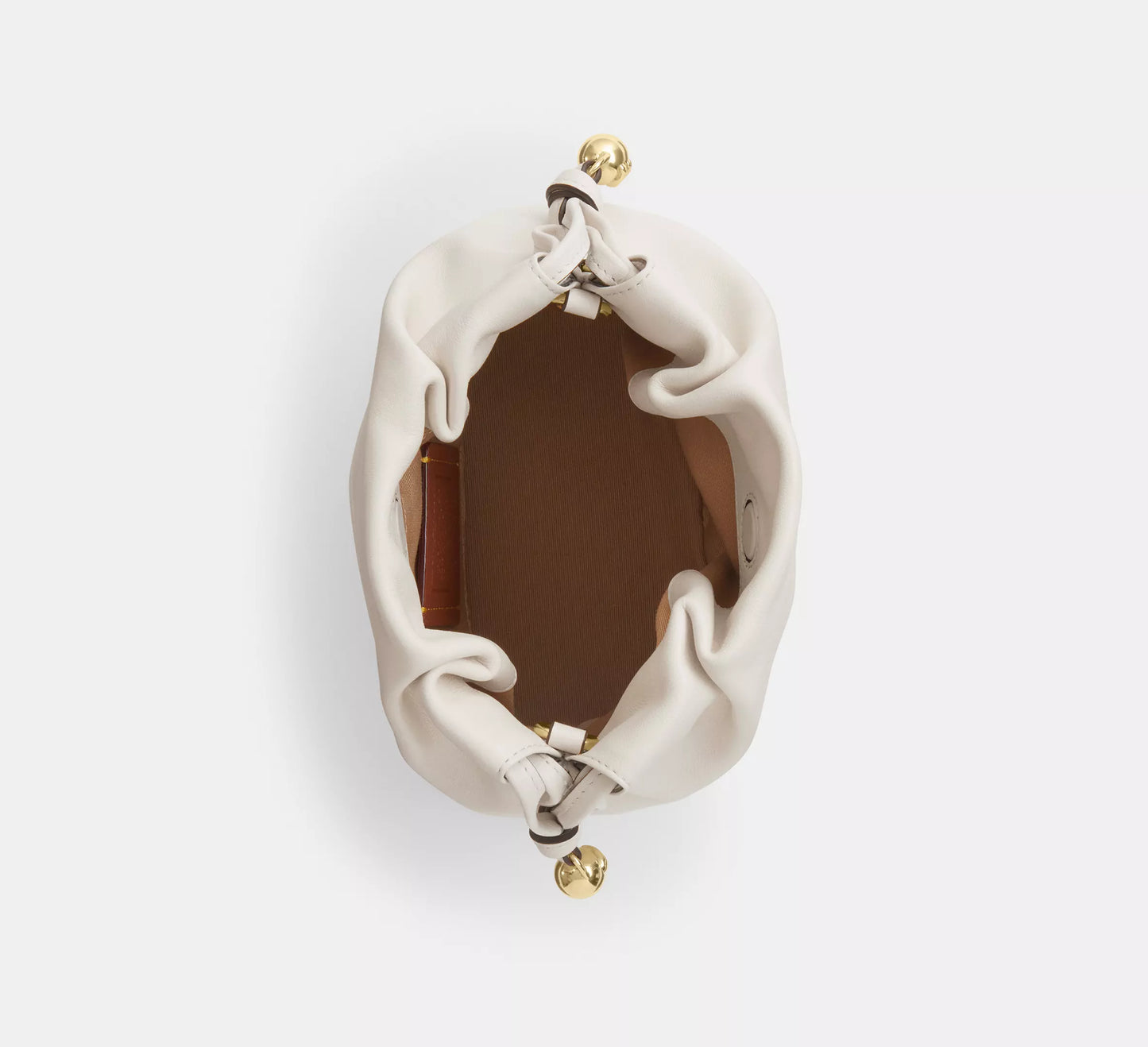 C-O-A-C-H Faye Mini Drawstring Bag – Elegant Luxe Women Bag (White)