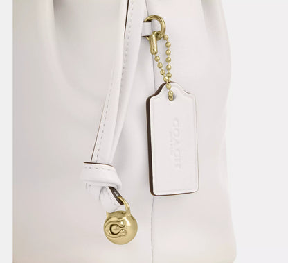 C-O-A-C-H Faye Mini Drawstring Bag – Elegant Luxe Women Bag (White)