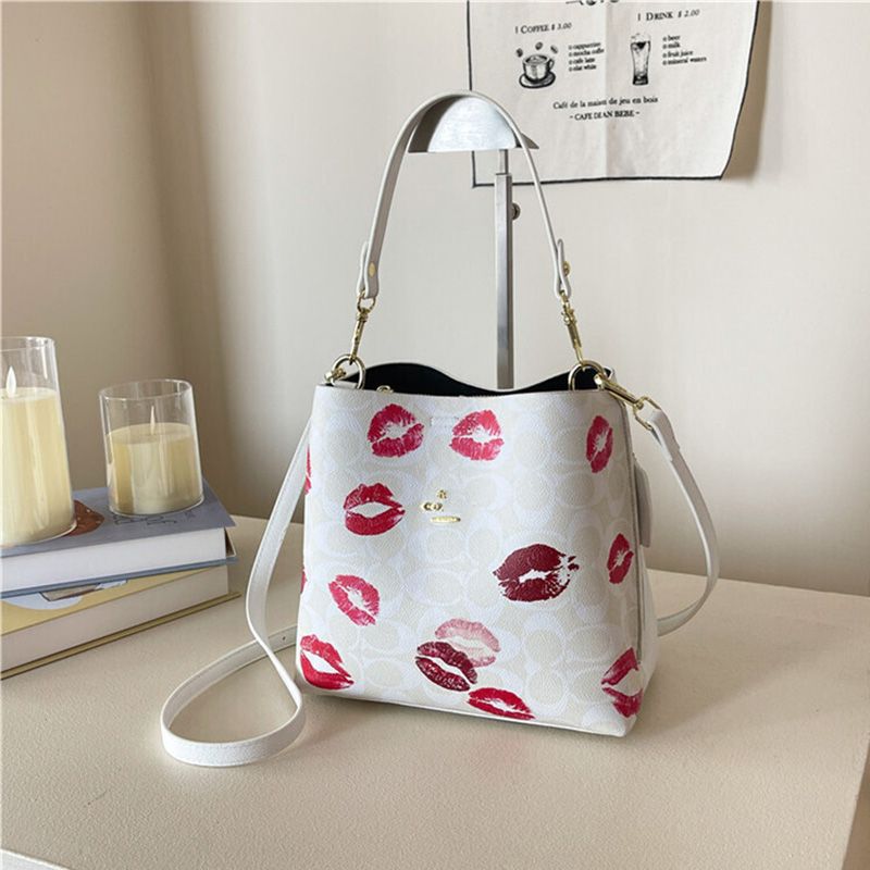 C-O-A-C-H BUCKET DESIGNER – Women Bag (White Design B)