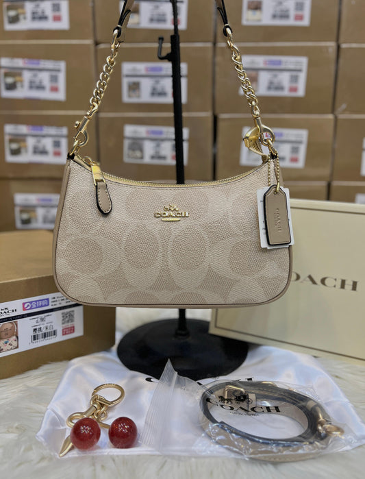 C-O-A-C-H Teri Shoulder Women Bag in Signature Canvas (Light Brown)
