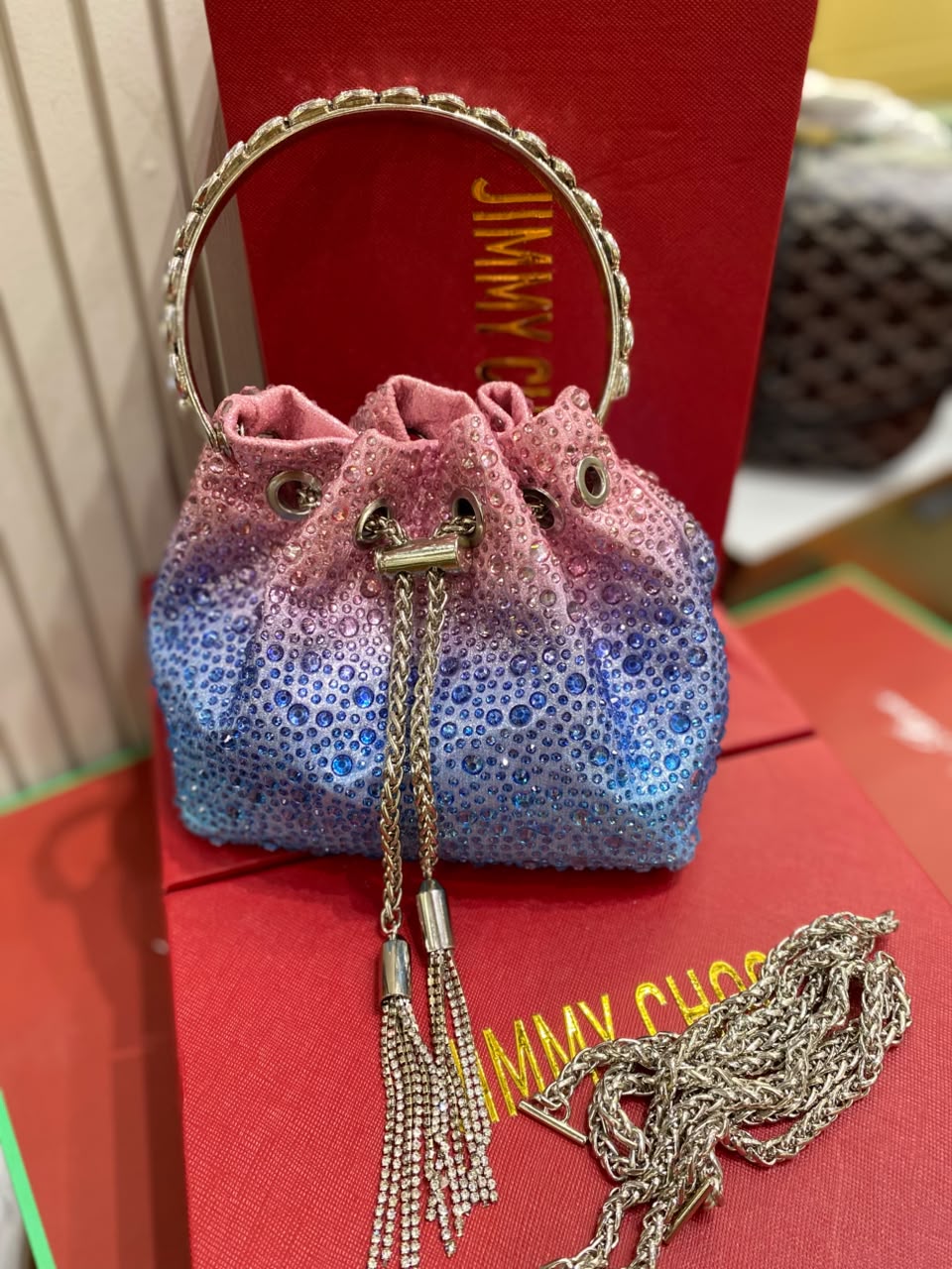 J-I-M-M-Y C-H-O-O Bon Bon Deep Merlot Satin & Crystal Hotfix Bucket Bag (Pink with Blue)