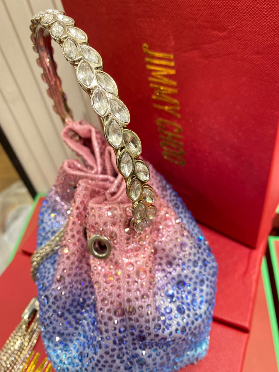 J-I-M-M-Y C-H-O-O Bon Bon Deep Merlot Satin & Crystal Hotfix Bucket Bag (Pink with Blue)