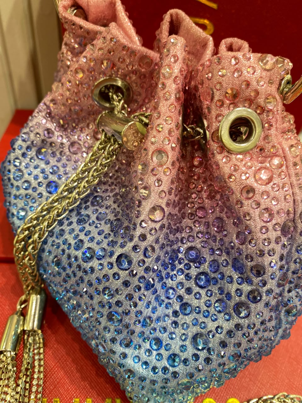 J-I-M-M-Y C-H-O-O Bon Bon Deep Merlot Satin & Crystal Hotfix Bucket Bag (Pink with Blue)
