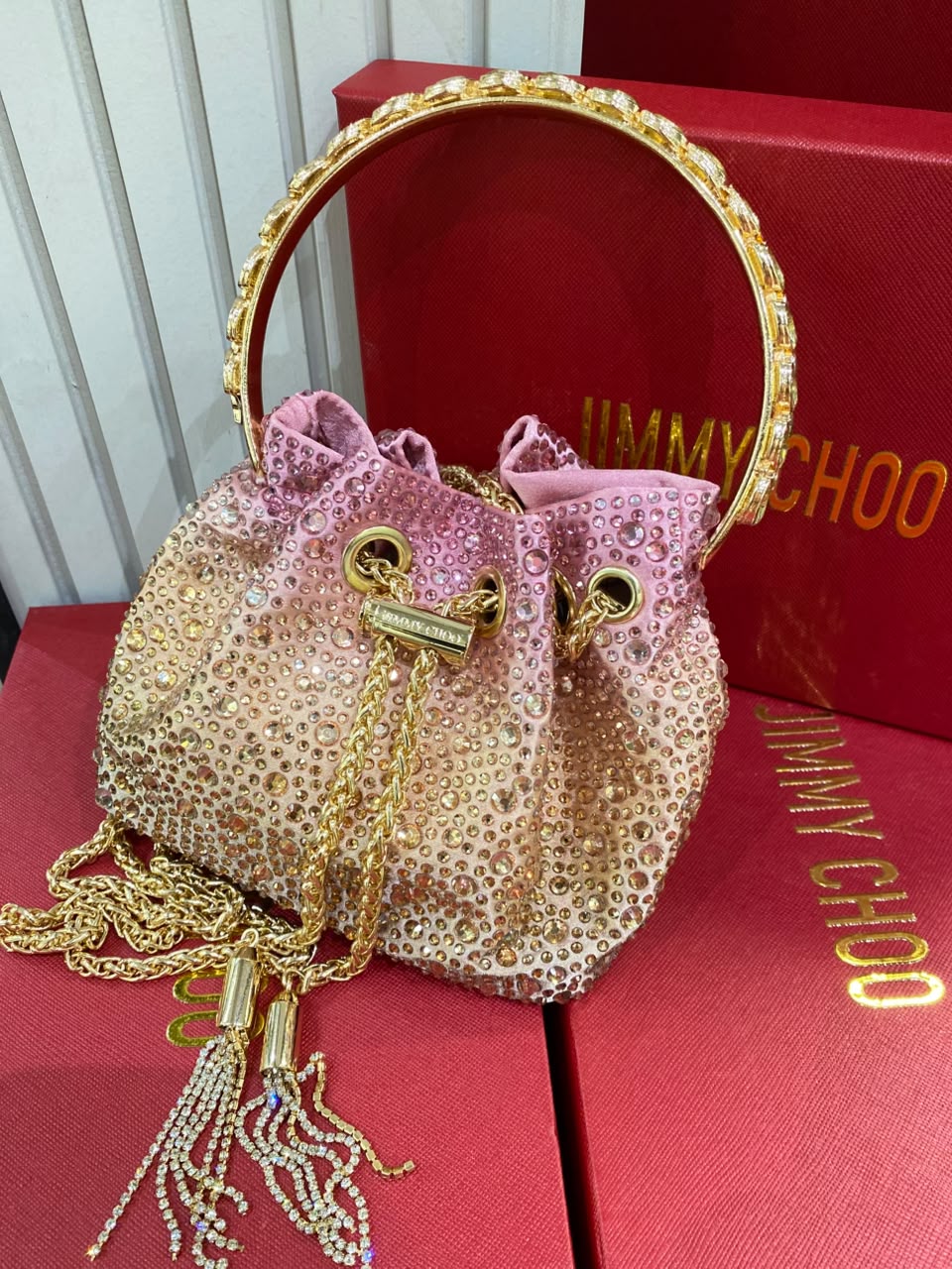 J-I-M-M-Y C-H-O-O Bon Bon Deep Merlot Satin & Crystal Hotfix Bucket Bag (Pink Gold)