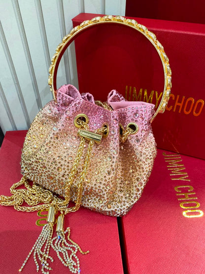 J-I-M-M-Y C-H-O-O Bon Bon Deep Merlot Satin & Crystal Hotfix Bucket Bag (Pink Gold)