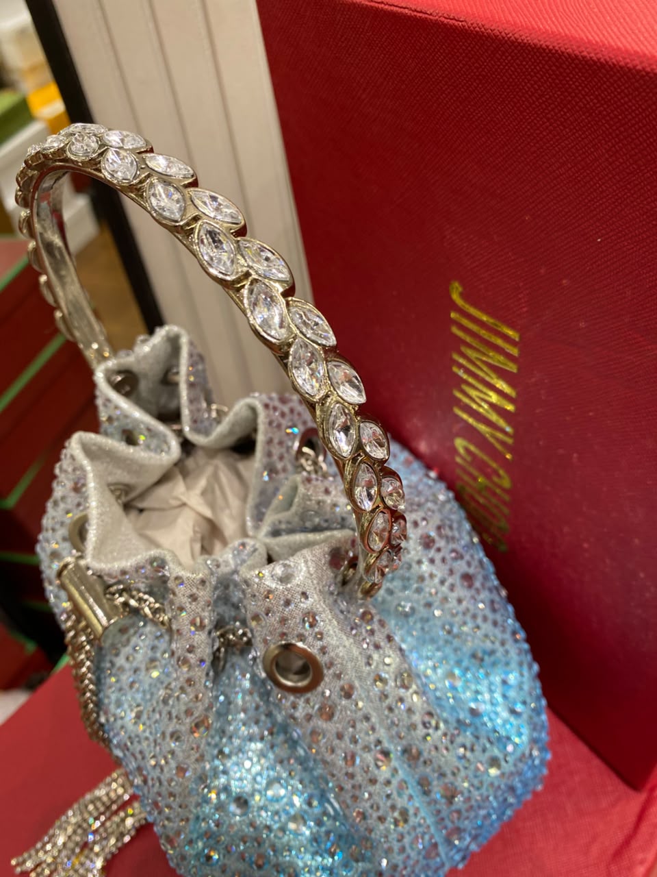 J-I-M-M-Y C-H-O-O Bon Bon Deep Merlot Satin & Crystal Hotfix Bucket Bag (Sky Blue)
