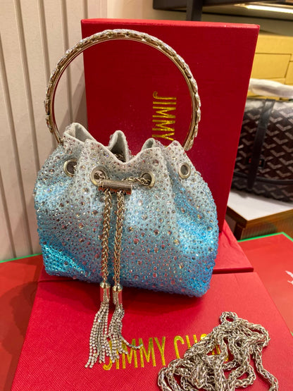 J-I-M-M-Y C-H-O-O Bon Bon Deep Merlot Satin & Crystal Hotfix Bucket Bag (Sky Blue)