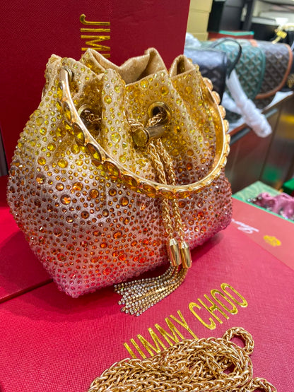 J-I-M-M-Y C-H-O-O Bon Bon Deep Merlot Satin & Crystal Hotfix Bucket Bag (Yellow Gold)